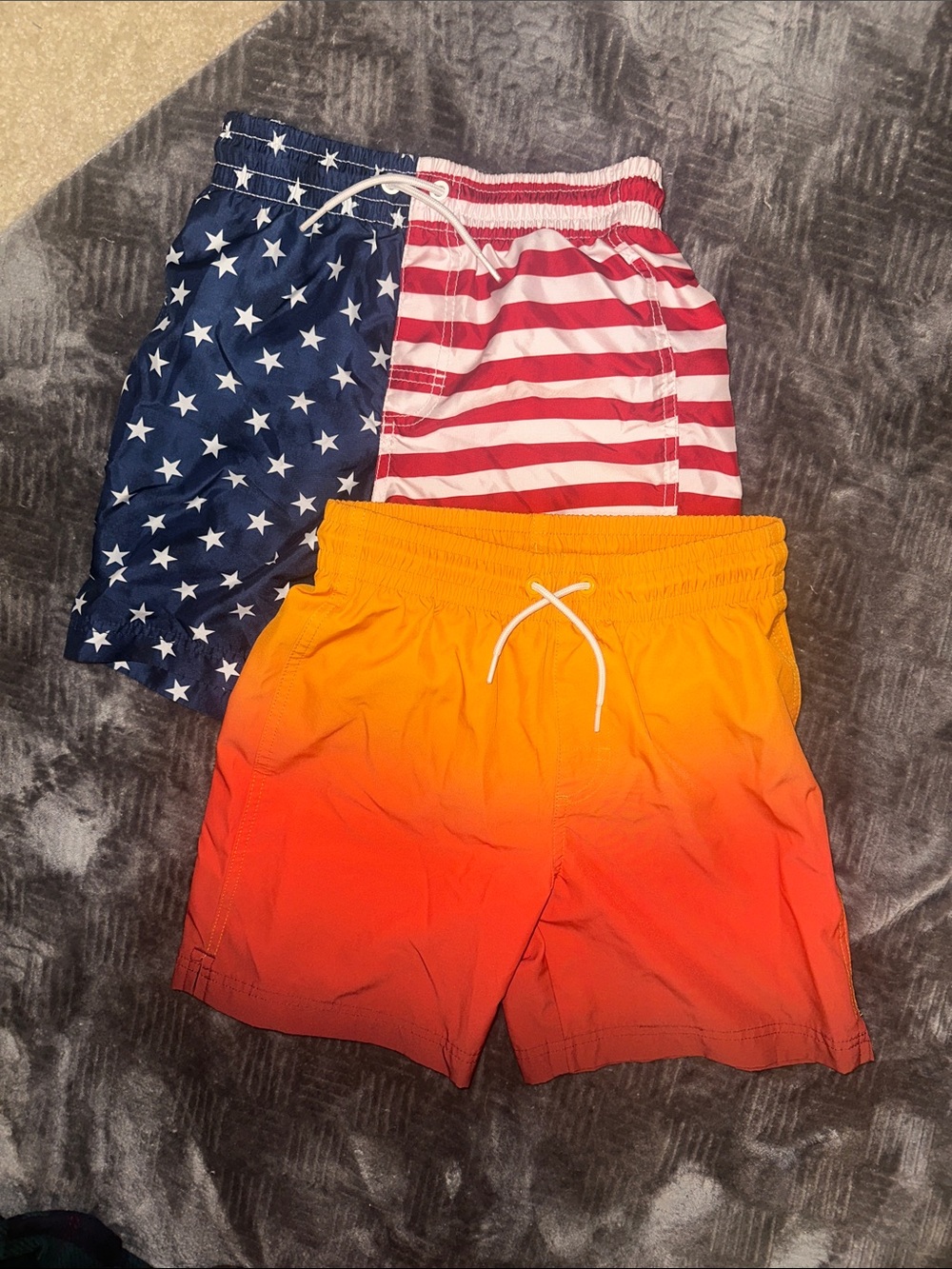 Old Navy Boys' Navy/White/Red Star & Stripe and Orange-to-Red Ombre Swim Trunks